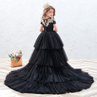 Little girl’s high low black ball gown