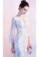 Full sleeve white wedding gown