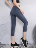Woman’s 7/10 length sport pants running pants with pocket for cellphone
