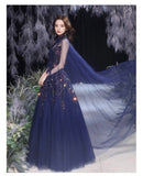 Blue sequin ball gown with cloak