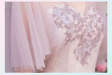 Short pink tulle bridesmaid dress