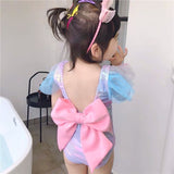 Little girl’s cute bowknot swimwear and cap