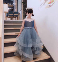 Sleeveless sparkly blue ball gown for little girl