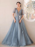 Blue pleated prom dress
