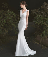 White mermaid wedding gown sleeveless