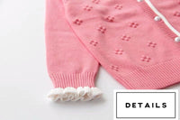 Little girl’s knitting sweater