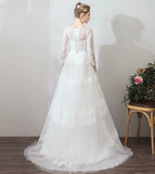 Long sleeve lace and tulle wedding dress