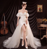 Off the shoulder wedding dress with removable train