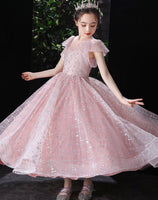 Little girl’s sparkly pink prom dress