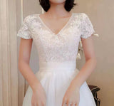 Short sleeve lace and tulle modest wedding dress