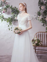 Short sleeve lace and tulle modest wedding dress