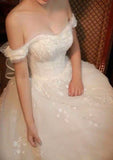 Off the shoulder embroidered wedding dress