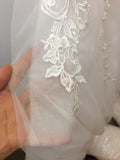 Embroidered champagne tailed wedding dress strapless backless