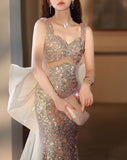 Sparkly champagne prom dress with bowknot tailing