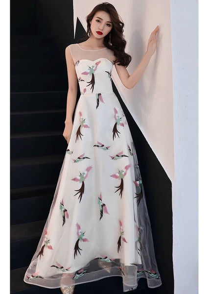Sleeveless embroidered bird tailed prom dress