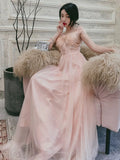 Light pink tulle prom dress with tiny pearls
