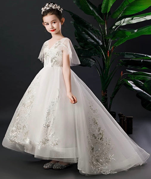 White embroidered trailing quinceanera dress