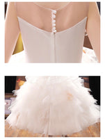 White embroidered ball gown for little girl
