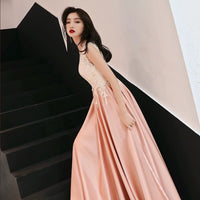Sleeveless light pink lace and satin prom dress
