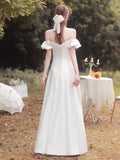 Off the shoulder wedding dress with vent