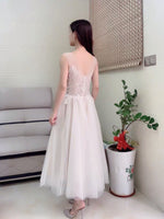 Sleeveless embroidered champagne wedding dress