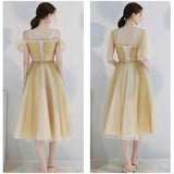 Light yellow tulle bridesmaid dress