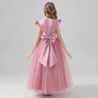 Little girl's pink party dress with pearls