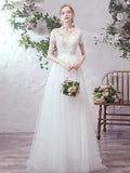 Short sleeve lace and tulle modest wedding dress