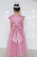 Little girl's pink party dress with pearls