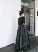 Black sequin short sleeve evening gown