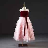 Little girl’s red pink ball gown