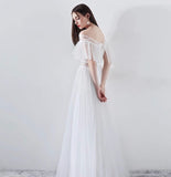Boat neck white tulle wedding gown