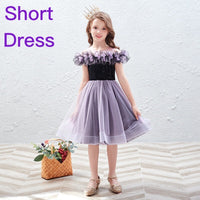 Little girl’s black purple tailed ball gown