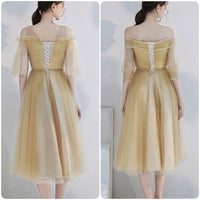 Light yellow tulle bridesmaid dress