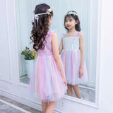 Little girl’s pink sequin rainbow dress