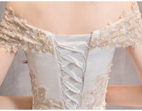 Off the shoulder embroidered modest wedding dress
