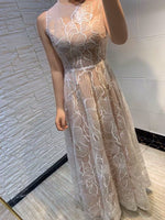 Sleeveless beige lace dress