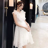 Short white tulle wedding gown