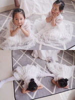 Little girl’s sequin white dress