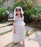 Little girl’s white tulle dress
