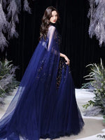 Blue sequin ball gown with cloak