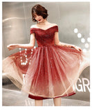 Off the shoulder sparkly red and black prom dress