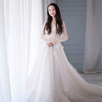 Full sleeve embroidered white wedding dress