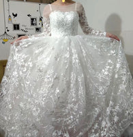 Long sleeve white embroidered wedding dress