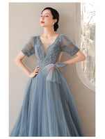 Blue pleated prom dress