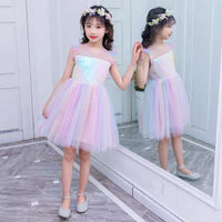 Little girl’s pink sequin rainbow dress