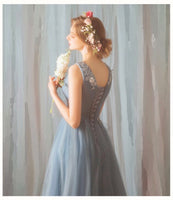 Long blue tulle gown v neck embroidered
