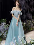 Off the shoulder sparkly blue green prom dress