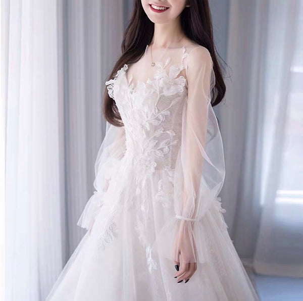 Full sleeve embroidered white wedding dress