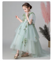 Little girl’s green ball gown